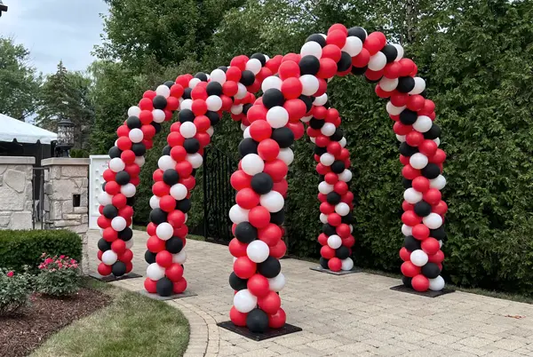 Outdoor organic balloon arches and garland to welcome dancers to Reverie Dance Academy