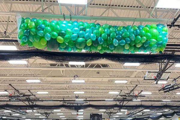 Balloon drops in high school gym